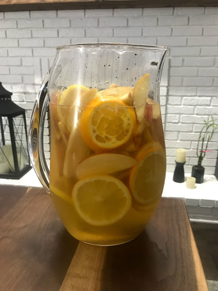 Thanksgiving Dinner Appetizer Apple Cider Sangria with gluten-free and dairy-free recipes by Elena McCown, LLC a health coach in Franklin, TN