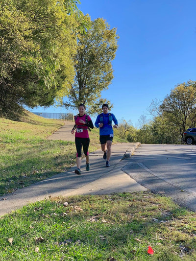 Defeated Creek Trail Half Marathon Race Recap by Elena McCown, LLC a health coach in Franklin, TN